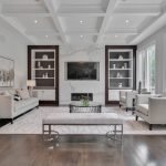 white wooden coffee table near white sofa