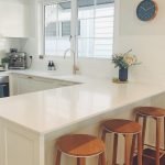 brown wooden chair beside white wooden table