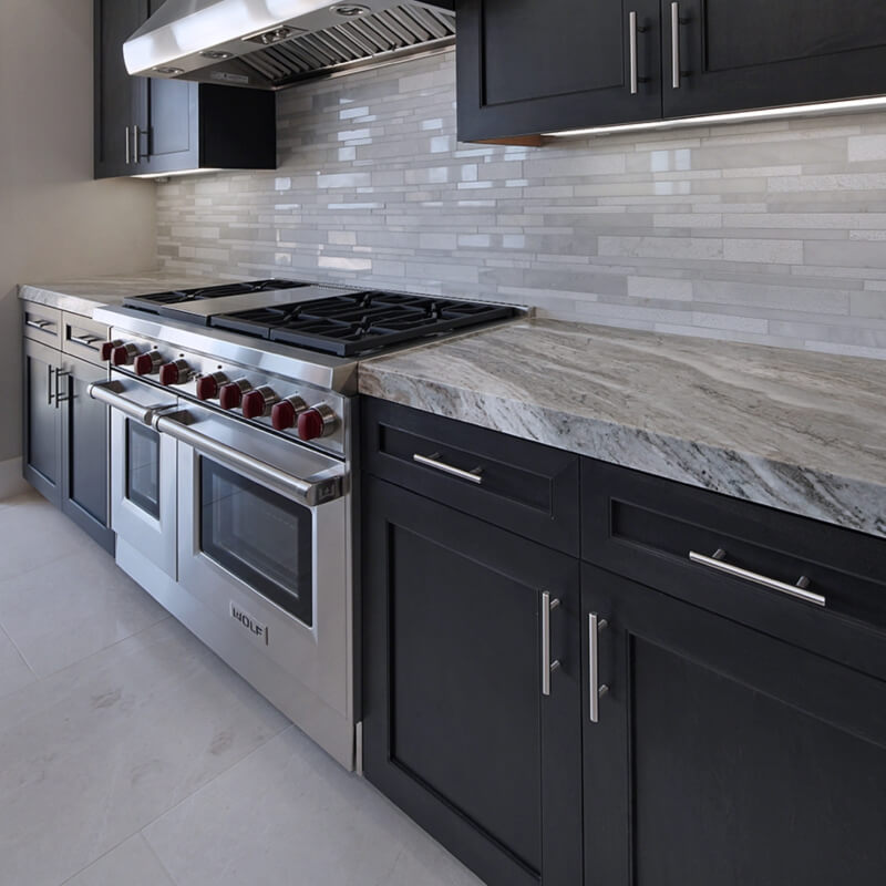 Kitchen backsplash and countertop material pairing detail supports Selecting Tile or Slab Details to Compliment Small Kitchen Surfaces by showing the room feature the section discusses.