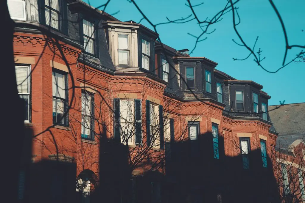 a red brick building with many windows on it