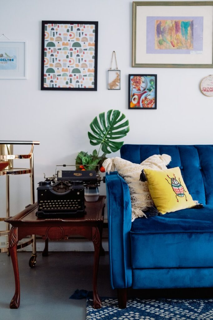 blue sofa with throw pillows