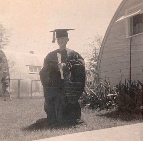 Ed, in Dad's graduation cap and gown - Denver, June 1950