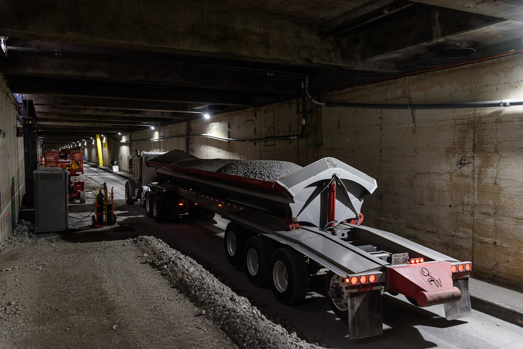 Moving a load of recycled viaduct concrete into the Battery Street Tunnel