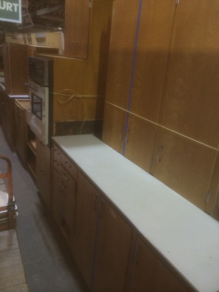 Large, clean, mid-century wood front and plywood construction cabinet set - $1,100; other sets - $400-600 and $1,500