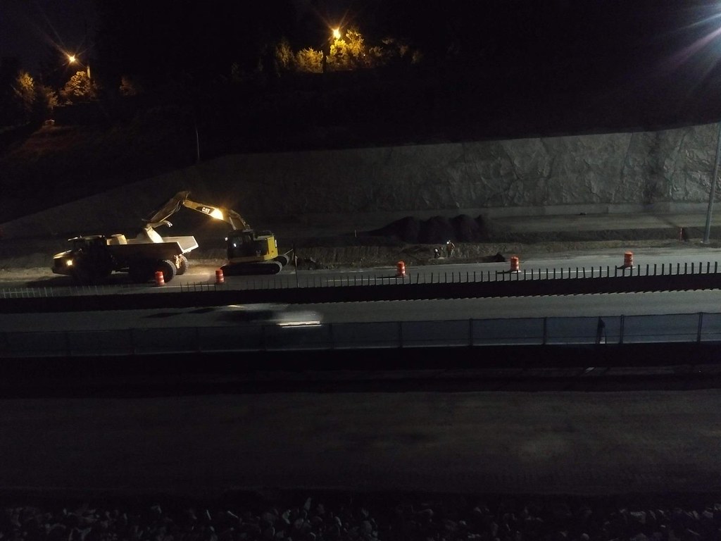 Nightshift crews excavate highway 1 and place pavement gravels and recycled concrete aggregates - Lower Lynn Project