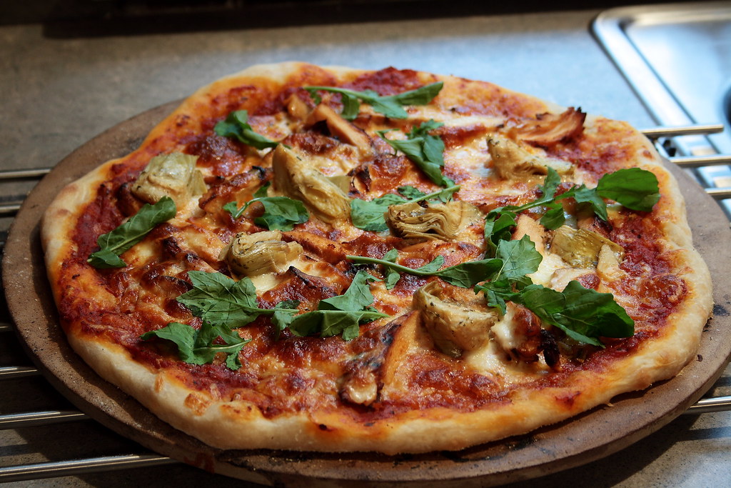 Pizza: Grilled chicken, artichoke hearts, and arugula