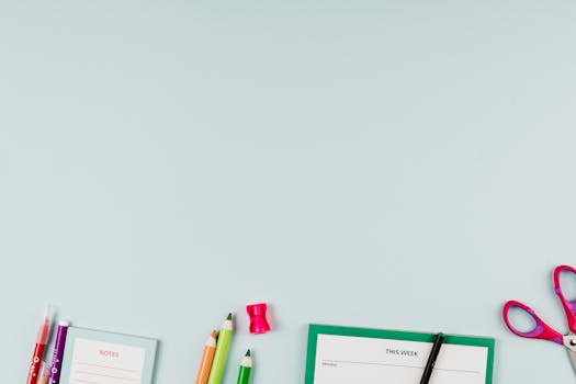 Writing Materials on White Table