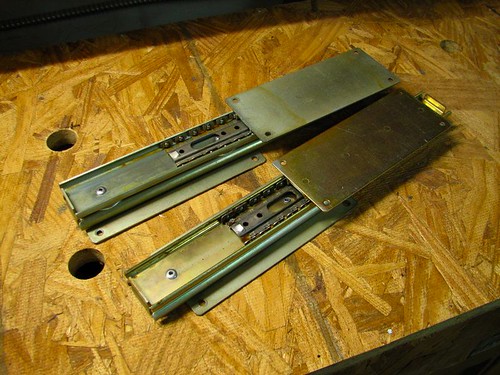 Drawer slides, riveted together.