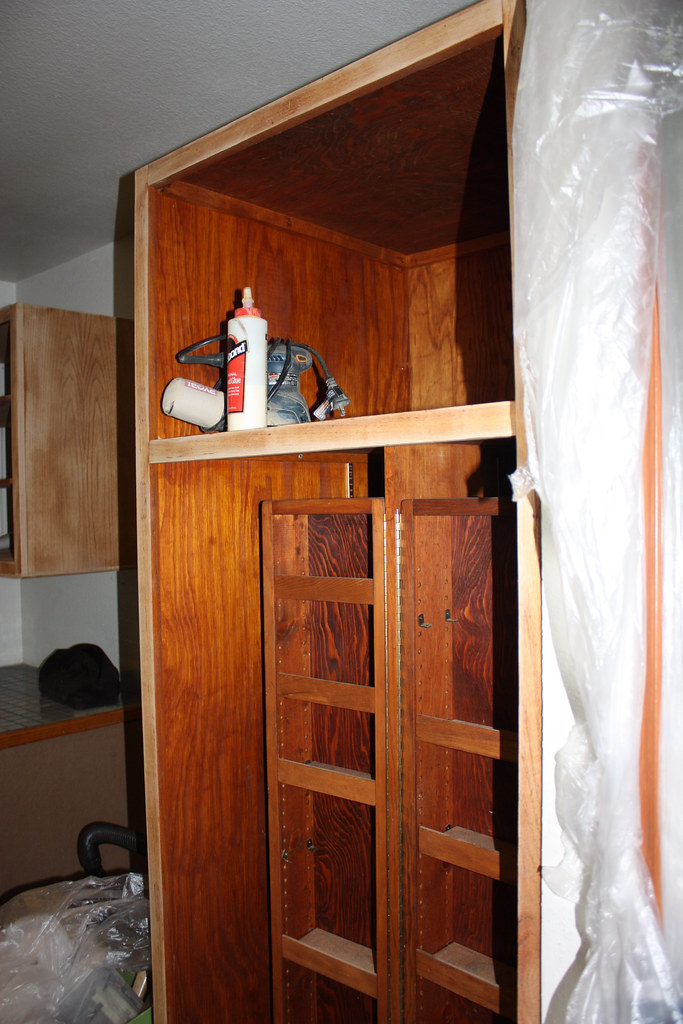 Yes. The image shows what looks like an empty cabinet which relates to the topic of removing cabinet doors. Removed the old cabinet doors