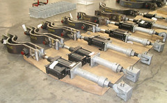 Hydraulic Shock Suppressor and Pipe Clamp Assemblies