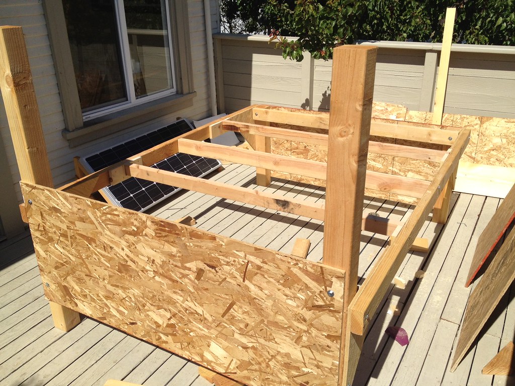 Finally finished my bed frame. The major parts are held together with 10 lag bolts for easy assembly/disassembly.