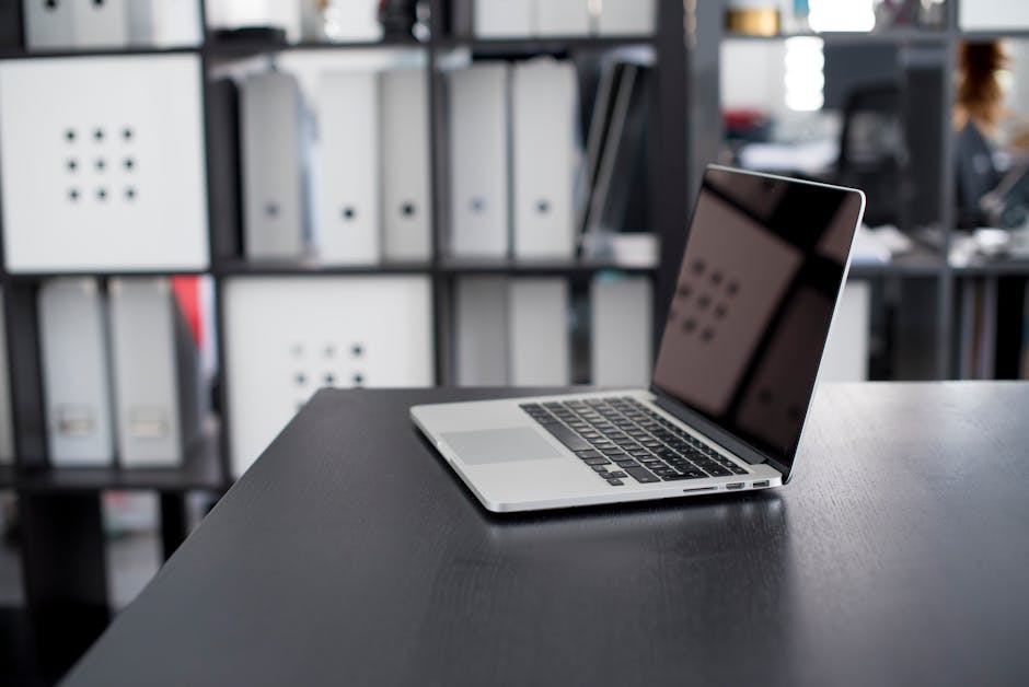 Freelance Interior Design Macbook Pro on Brown Wooden Table