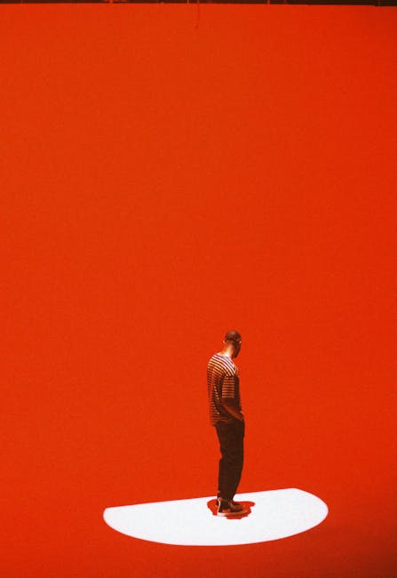 Modern LA Man Standing on Red Background