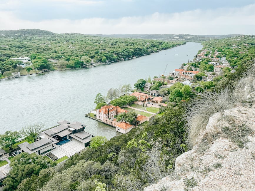 Clouds over river and village in Texas