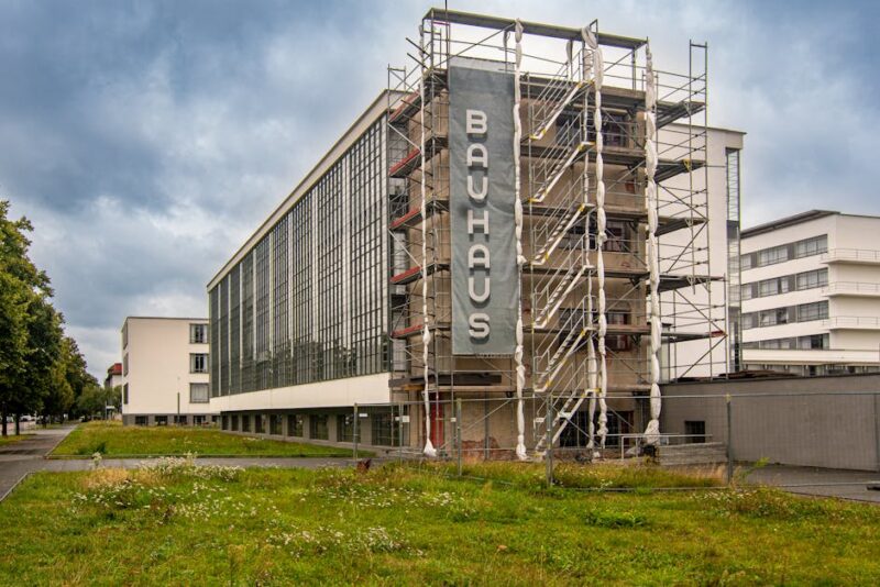 Dessau Germany Bauhaus: Modernism Bauhaus Sign on Scaffolding by Building