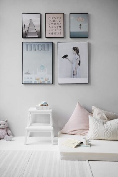 Scandinavian Bedroom Design: How to Create the Perfect Minimalistic Look Five Posters Mounted on Wall