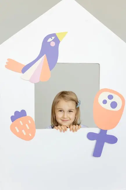 A smiling girl sketching materials for drawing a house