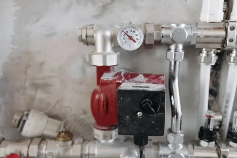 Installing a Heat Pump: Step-by-Step DIY Guide Steel Pipes with Pressure Gauge