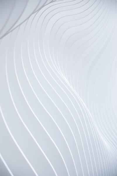 Close-up of a white wall with wavy lines