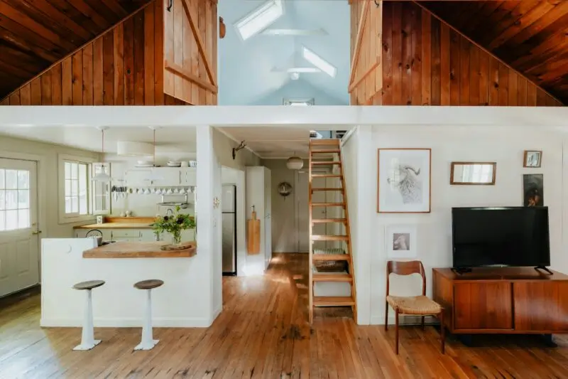 A split photo of a living room and kitchen