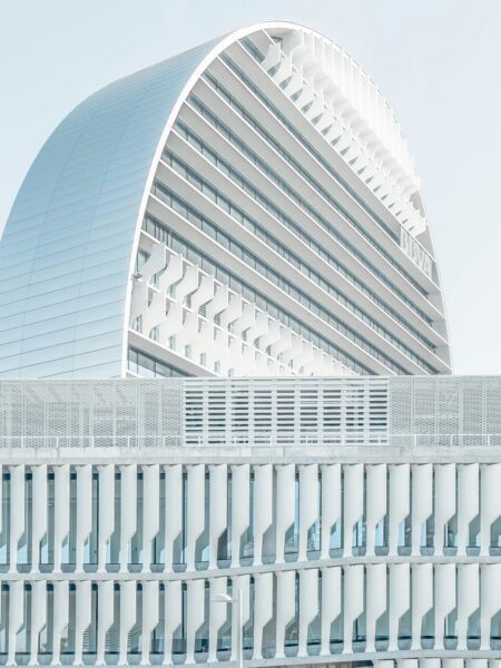 mirrored building under blue sky