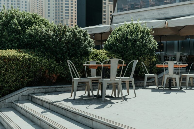 A bunch of chairs that are sitting on some steps