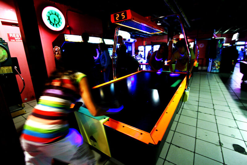 kids playing air hockey at Pinball Pete's