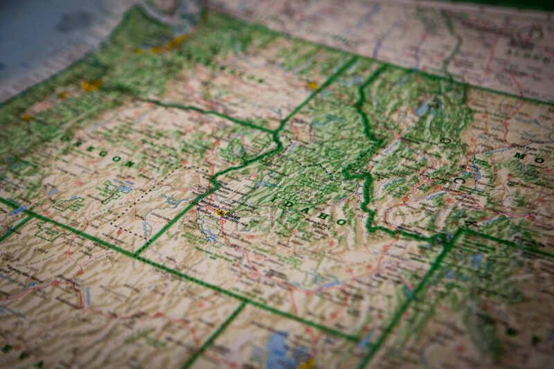 Close-up of a detailed topographic map highlighting Idaho and its surrounding regions.