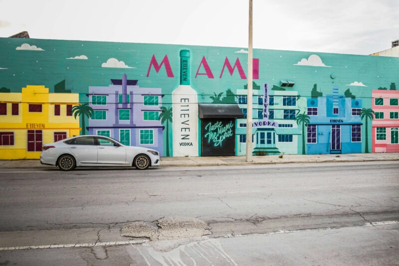 Colorful Miami mural featuring E11even Vodka in vibrant street art style.