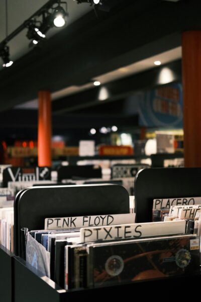 A close-up of vinyl records in a Dublin music store, showcasing classic rock collections.