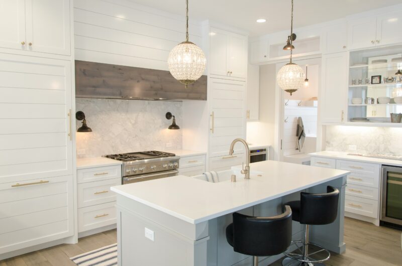 kitchen island with sink and dishwasher