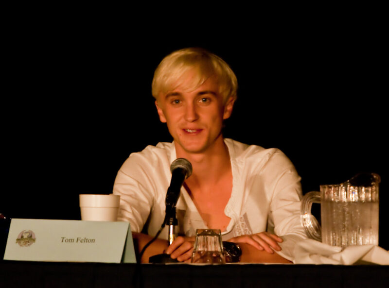 Tom Felton posing at Dragon Con, fan convention