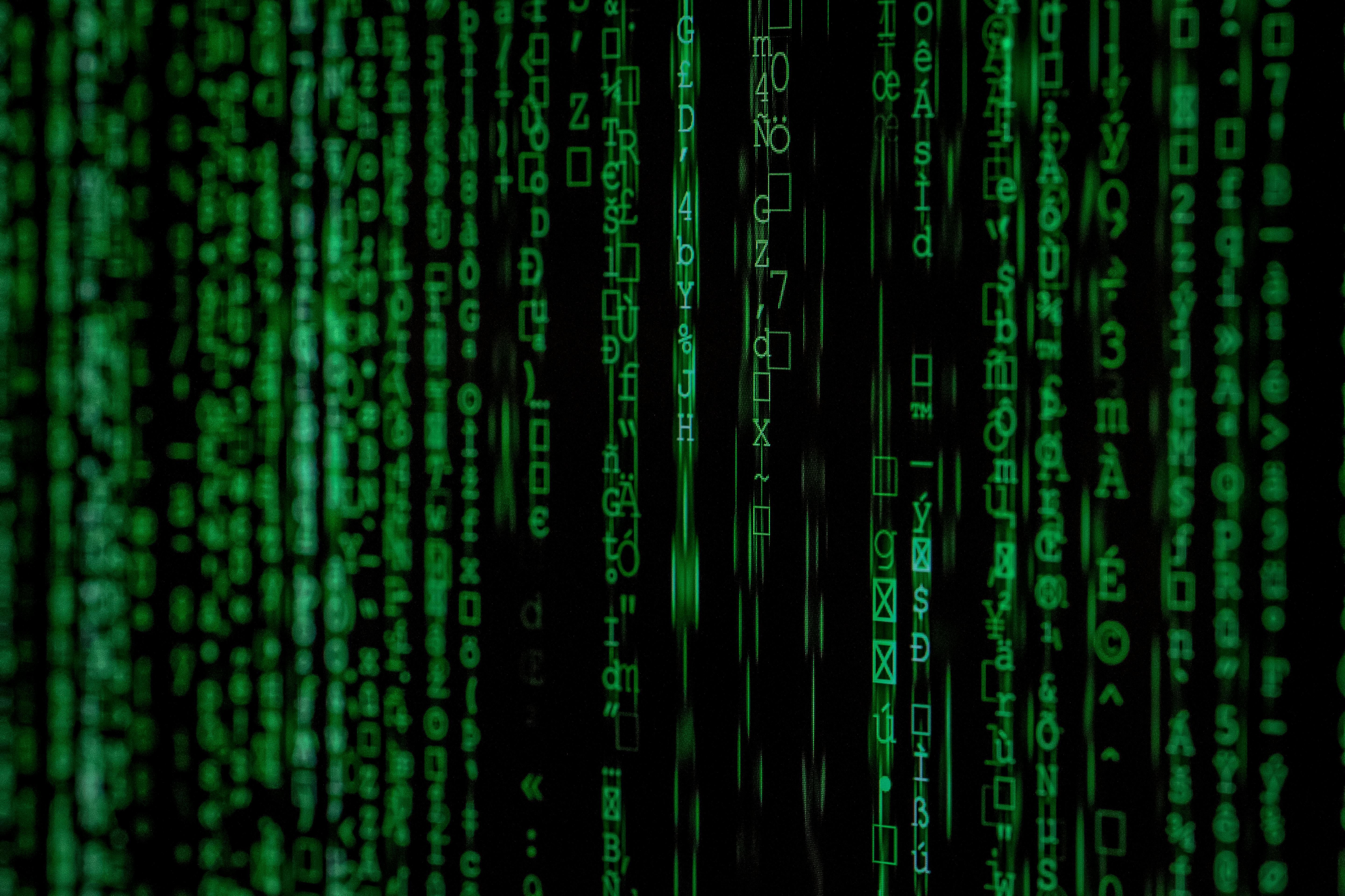 Abstract green matrix code background with binary style.