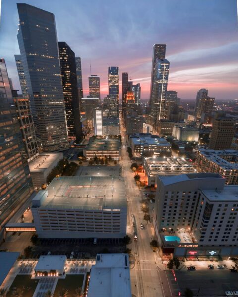 A beautiful aerial view of Houston's skyline at twilight showcasing the city's vibrant urban atmosphere.