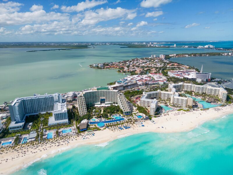 Stunning aerial shot of Cancun's pristine beaches and luxury resorts along the coast.