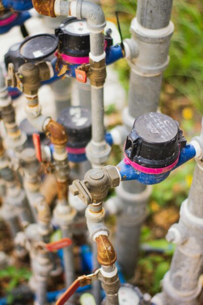 A close-up view of an industrial setup with gauges, valves, and pipes.