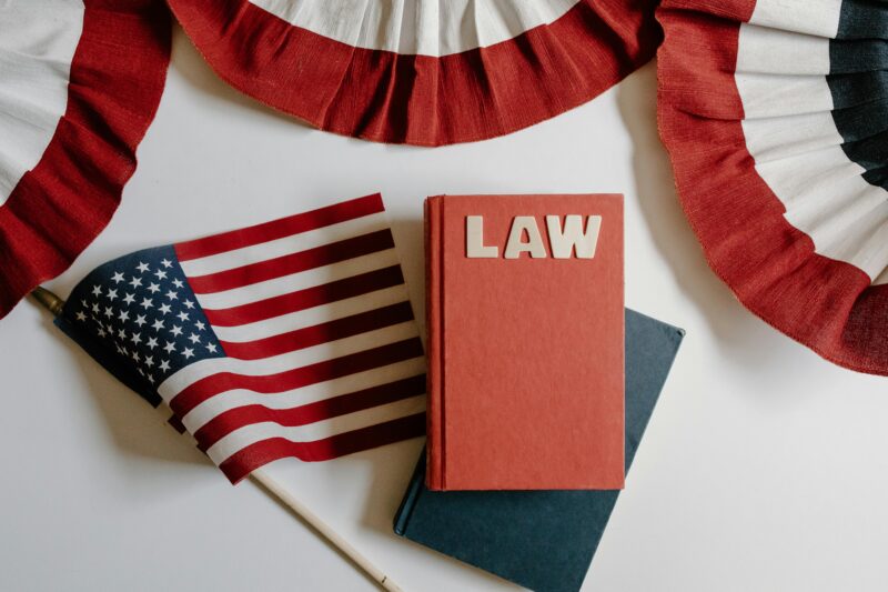 American flag with a law book.