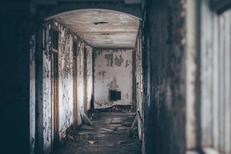 Explore the eerie atmosphere of a decaying, abandoned hallway in Gary, Indiana.