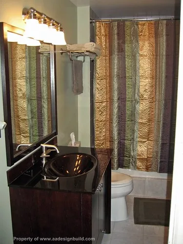 www.aadesignbuild.com, Master Bathroom in Condo Design and Remodeling, Elevated Tub, Grohe Shower Faucet, Porcelain Tile, Washington DC, Aging in Place