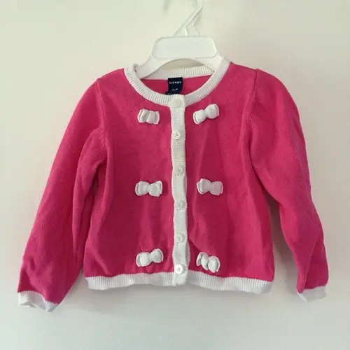 Old Navy 12-18M cardigan. Some minor discoloration on white placket by buttons. oxiclean should work on it! $4 plus ship. Leave PayPal and zip to claim!