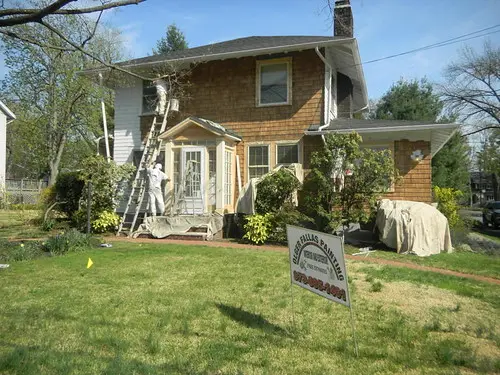 Olger Fallas Painting works on the Exterior Painting of Maplewood New Jersey Home