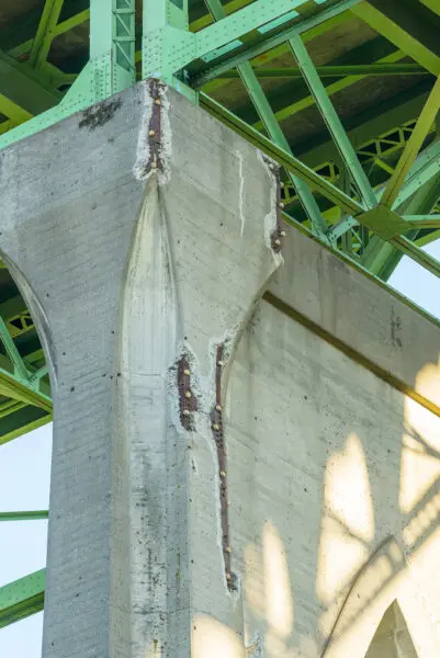 Spalling concrete on the pier columns