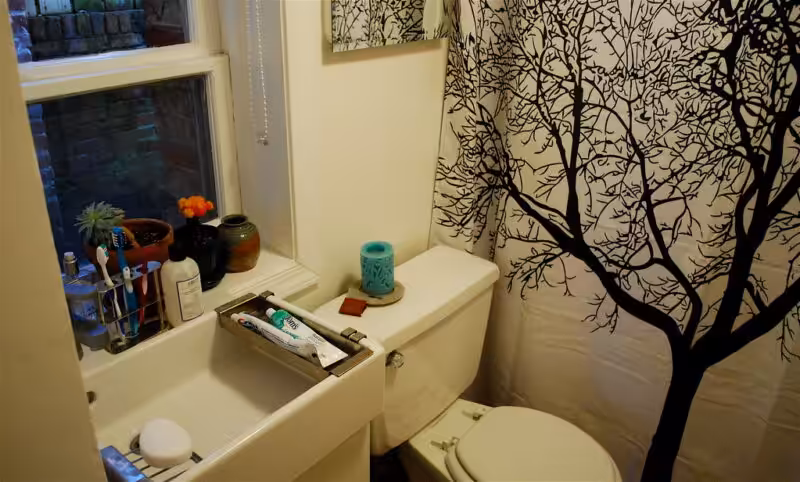 tiny sink in tiny bathroom