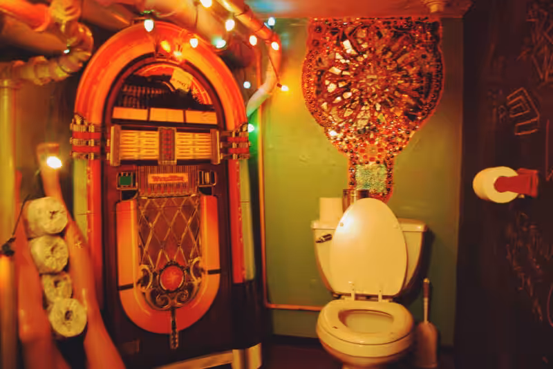 A decorated eclectic bathroom.