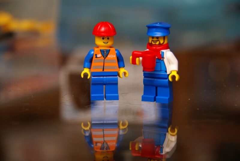 A couple of legos standing next to each other