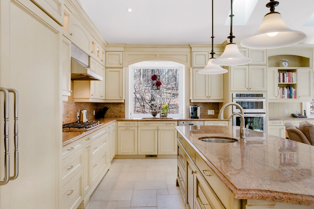 contemporary home interior design kitchen interior designer with patterned cement tiles on backsplash.