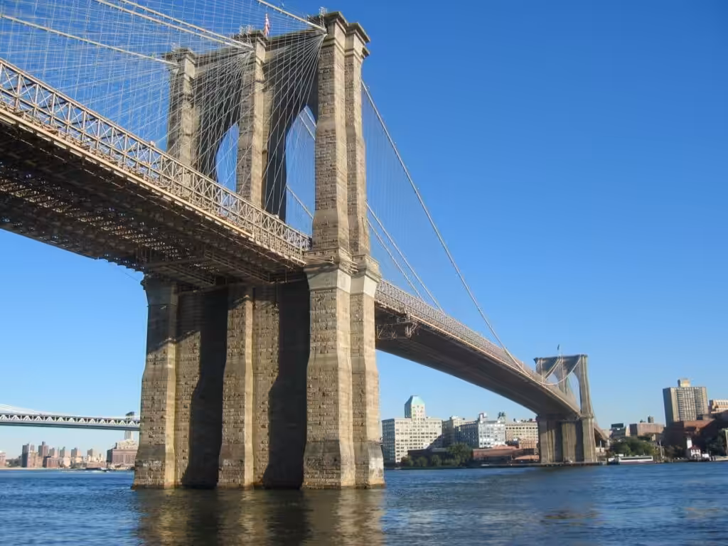 Brooklyn Bridge stone towers and cable web in New York City