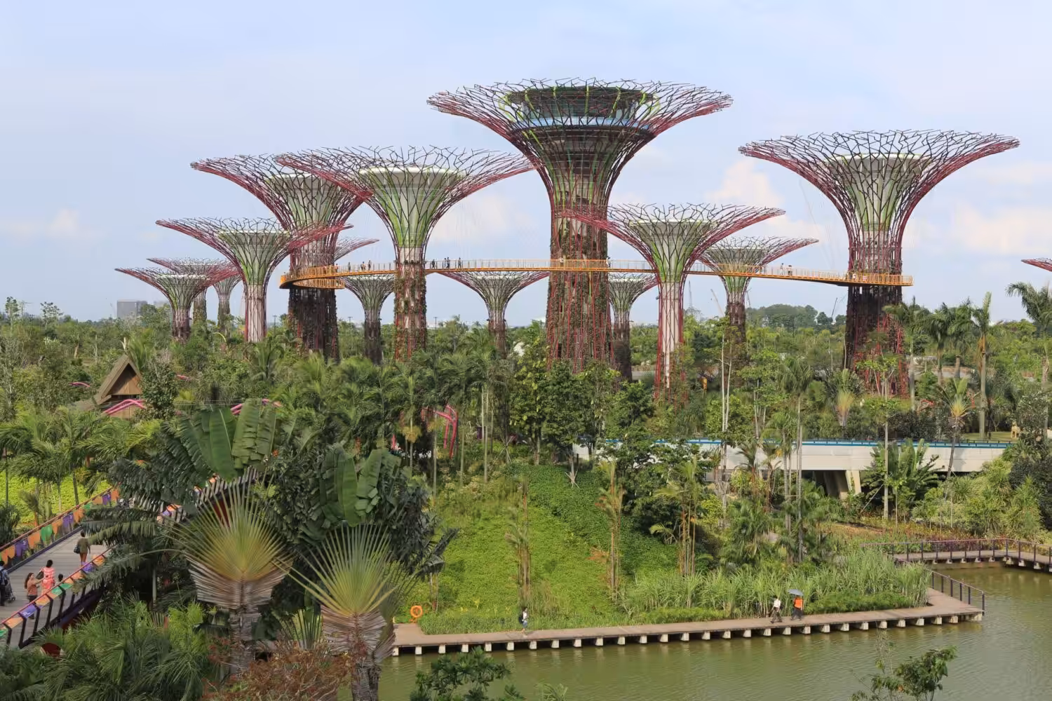 Urban street and civic design reference featuring iconic vertical green structures with solar energy integration.