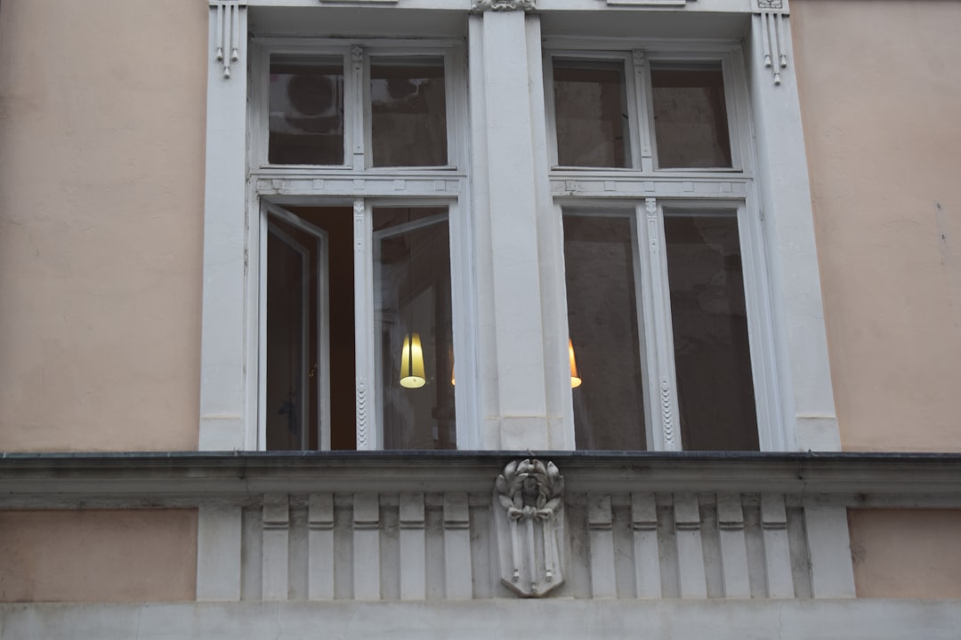 A detailed view of a building's ornate window frame.