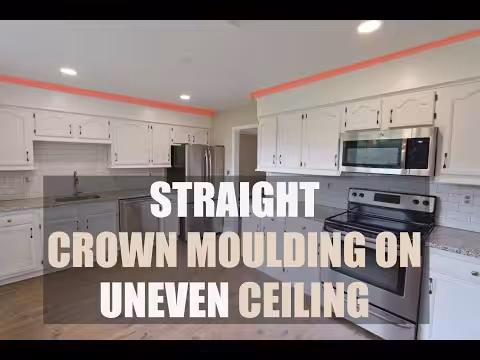 Installing crown molding on an uneven ceiling to hide imperfections.